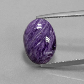 Charoíta violeta natural de 5,59 ct, corte óvalo, opaco