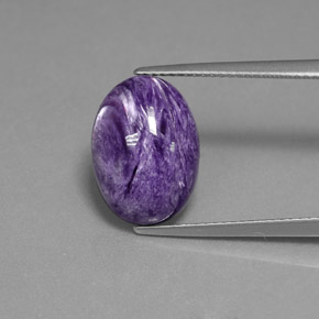 Charoíta violeta natural de 5,52 ct, corte óvalo, opaco