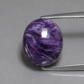 Charoíta Violeta natural de 6.93 ct, Corte Óvalo, Opaco