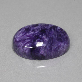 Charoíta violeta natural de 15,67 ct, corte óvalo, opaco