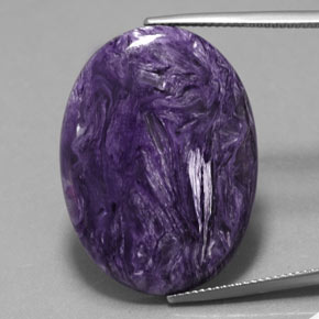 Charoíta violeta natural de 24,63 ct, corte óvalo, opaco