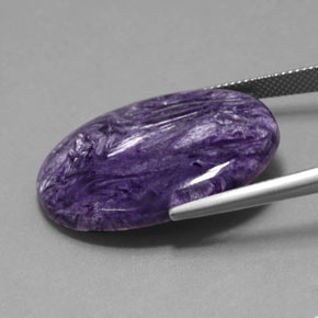 Charoíta violeta natural de 24,63 ct, corte óvalo, opaco