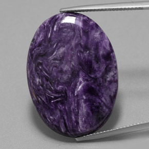 Charoíta violeta natural de 23,69 ct, corte óvalo, opaco