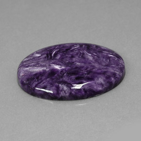 Charoíta violeta natural de 23,69 ct, corte óvalo, opaco