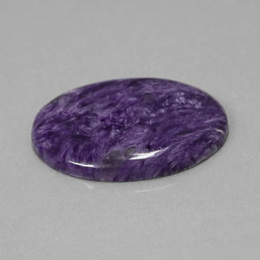 Charoíta Violeta natural de 23.93 ct, Corte Óvalo, Opaco