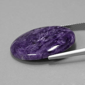 Charoíta Violeta natural de 23.93 ct, Corte Óvalo, Opaco
