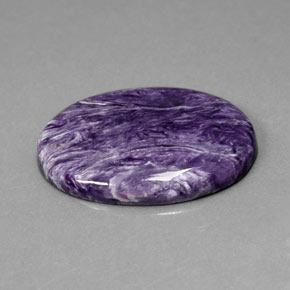 Charoíta violeta natural de 25,13 ct, corte óvalo, opaco
