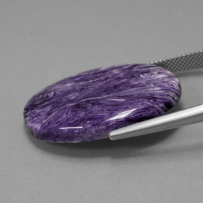 Charoíta violeta natural de 25,13 ct, corte óvalo, opaco