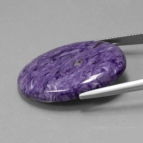 Charoíta Violeta natural de 27.59 ct, Corte Óvalo, Opaco