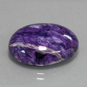 Charoíta violeta natural de 13,56 ct, corte óvalo, opaco