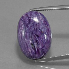 Charoíta violeta natural de 14,05 ct, corte óvalo, opaco