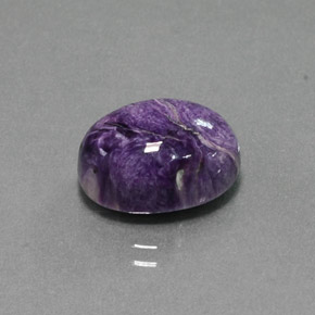 Charoíta violeta natural de 7,53 ct, corte óvalo, opaco