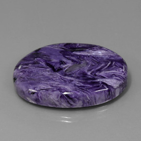 Charoíta violeta natural de 84,76 ct, corte óvalo, opaco