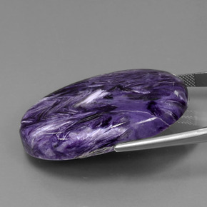 Charoíta violeta natural de 84,76 ct, corte óvalo, opaco