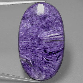 Charoíta violeta natural de 53,84 ct, corte óvalo, opaco