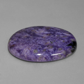 Charoíta violeta natural de 108,93 ct, corte óvalo, opaco