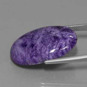 Charoíta violeta natural de 34,37 ct, corte óvalo, opaco