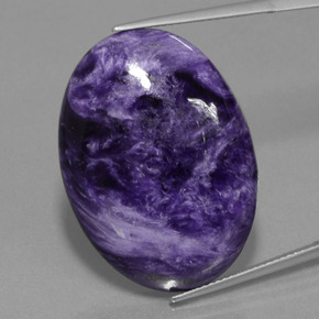 Charoíta Violeta oscuro natural de 34.59 ct, Corte Óvalo, Opaco