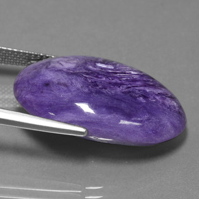 Charoíta violeta natural de 22,88 ct, corte óvalo, opaco