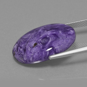Charoíta violeta natural de 14,65 ct, corte óvalo, opaco