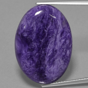 Charoíta violeta natural de 19,87 ct, corte óvalo, opaco