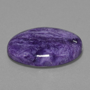 Charoíta violeta natural de 19,87 ct, corte óvalo, opaco