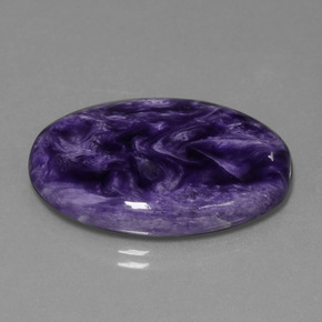 Charoíta Violeta natural de 29.31 ct, Corte Óvalo, Opaco
