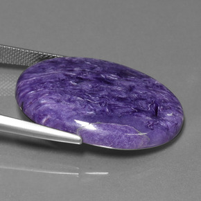 Charoíta violeta natural de 27,82 ct, corte óvalo, opaco