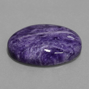Charoíta violeta natural de 22,07 ct, corte óvalo, opaco