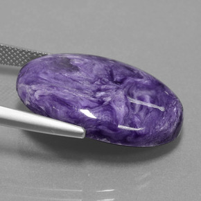 Charoíta violeta natural de 19,58 ct, corte óvalo, opaco