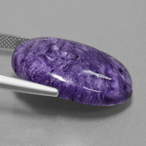 Charoíta violeta natural de 19,61 ct, corte óvalo, opaco