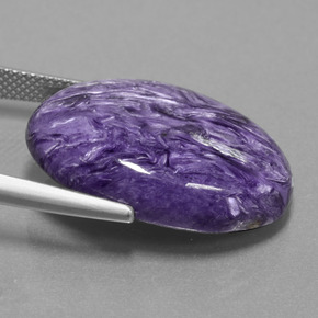 Charoíta violeta natural de 22,22 ct, corte óvalo, opaco