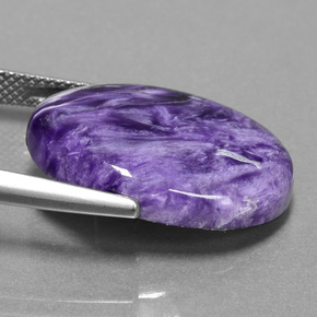 Charoíta violeta natural de 13,36 ct, corte óvalo, opaco