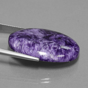 Charoíta violeta natural de 29,03 ct, corte óvalo, opaco