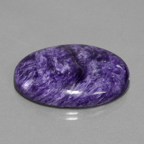 Charoíta violeta natural de 29,80 ct, corte óvalo, opaco