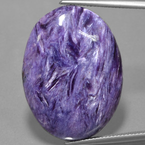 Charoíta violeta natural de 31,73 ct, corte óvalo, opaco