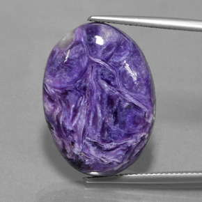 Charoíta violeta natural de 22,50 ct, corte óvalo, opaco