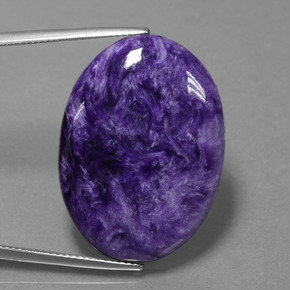 Charoíta violeta natural de 27,61 ct, corte óvalo, opaco
