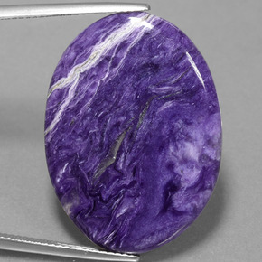 Charoíta violeta natural de 23,27 ct, corte óvalo, opaco