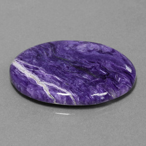 Charoíta violeta natural de 23,27 ct, corte óvalo, opaco