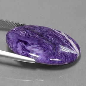Charoíta violeta natural de 23,27 ct, corte óvalo, opaco