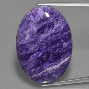 Charoíta violeta natural de 21,21 ct, corte óvalo, opaco