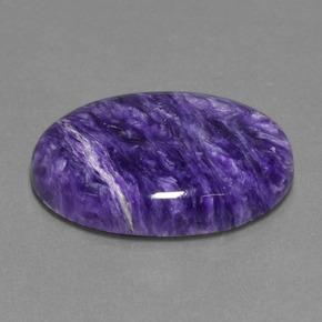 Charoíta violeta natural de 21,21 ct, corte óvalo, opaco