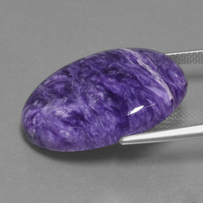 Charoíta violeta natural de 21,21 ct, corte óvalo, opaco