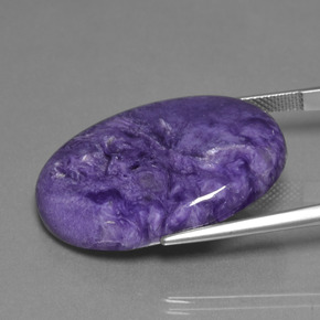 Charoíta violeta natural de 30,48 ct, corte óvalo, opaco