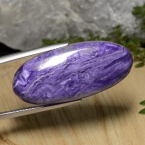 Charoíta violeta natural de 27,33 ct, corte óvalo, opaco