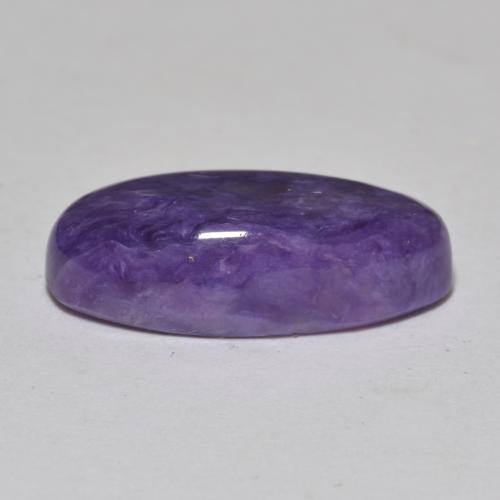 Charoíta Violeta medio natural de 6.37 ct, Corte Óvalo, Opaco