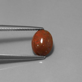 Ópalo chocolate multicolor natural de 1,04 ct, corte óvalo, opaco