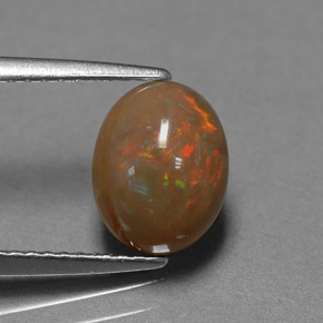 Ópalo chocolate multicolor natural de 1,42 ct, corte óvalo, opaco