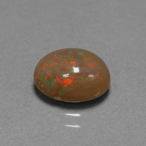 Ópalo chocolate multicolor natural de 1,42 ct, corte óvalo, opaco